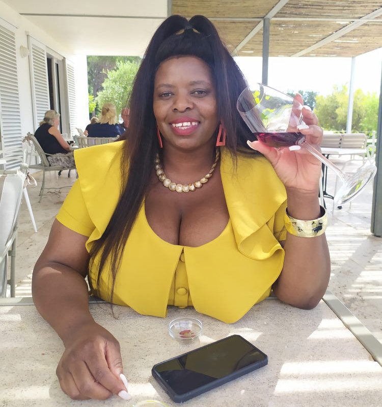 Jabu — a warm, caring empathetic listener and friend who listens, smiling in yellow